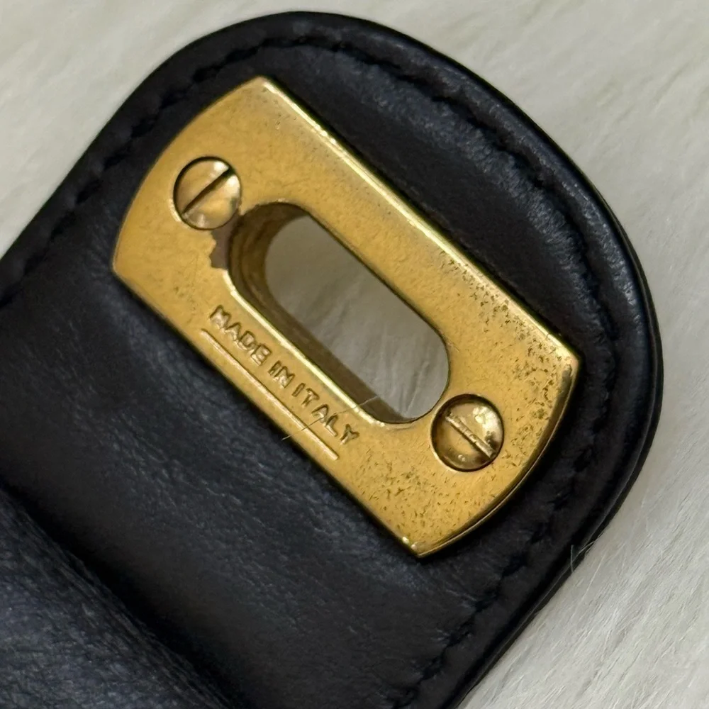 SALVATORE FERRAGAMO - BLACK LEATHER GOLD PLATED SECURE CLOSURE BIFOLD WALLET